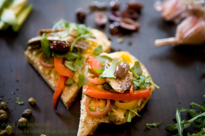 hummus, pepper, olive, avocado, sardine sandwiches